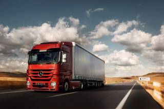 Автомобилда юк ва йўловчиларни халқаро ташишга рухсатномаларни айирбошлаш тартиби белгиланди